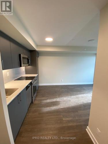 515 - 38 Monte Kwinter Court, Toronto, ON - Indoor Photo Showing Kitchen