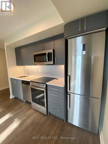 515 - 38 Monte Kwinter Court, Toronto, ON - Indoor Photo Showing Kitchen With Stainless Steel Kitchen