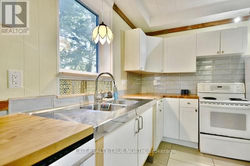 2415 Ronald Road, Springwater, ON - Indoor Photo Showing Kitchen With Double Sink