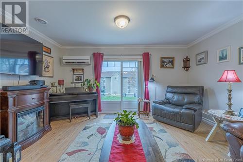 9 C Pleasant Street, Campbellton, NB - Indoor Photo Showing Living Room With Fireplace