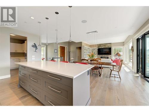 1690 Travertine Drive, Lake Country, BC - Indoor Photo Showing Kitchen With Fireplace With Upgraded Kitchen