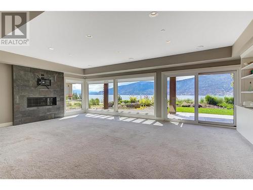 1690 Travertine Drive, Lake Country, BC - Indoor Photo Showing Living Room With Fireplace