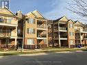 208 - 263 Georgian Drive, Oakville, ON  - Outdoor With Balcony With Facade 