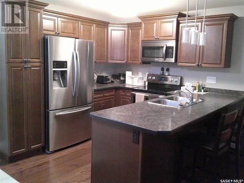 217 3630 Haughton Road E, Regina, SK - Indoor Photo Showing Kitchen With Double Sink With Upgraded Kitchen