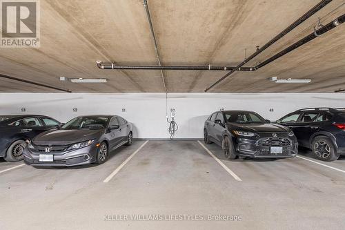 1210 - 330 Ridout Street N, London, ON - Indoor Photo Showing Garage