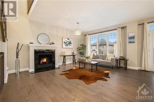 274 Huntsville Drive, Kanata, ON - Indoor Photo Showing Living Room With Fireplace