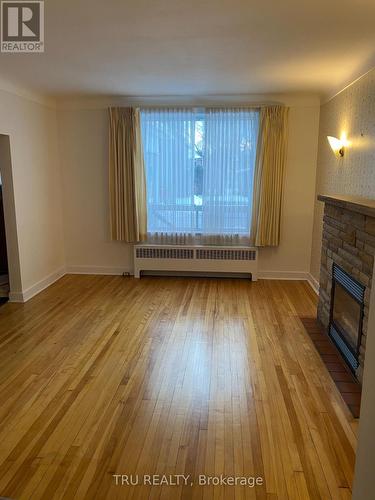 157 Bayswater Avenue, Ottawa, ON - Indoor Photo Showing Living Room With Fireplace