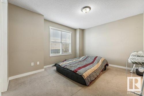 #58 6075 Schonsee Wy Nw, Edmonton, AB - Indoor Photo Showing Bedroom