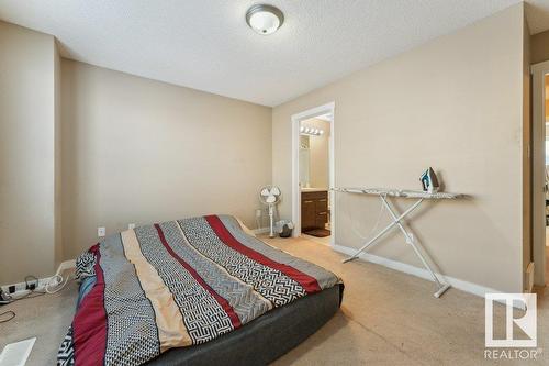 #58 6075 Schonsee Wy Nw, Edmonton, AB - Indoor Photo Showing Bedroom