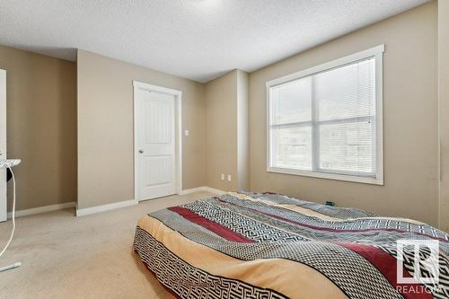 #58 6075 Schonsee Wy Nw, Edmonton, AB - Indoor Photo Showing Bedroom