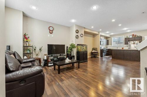 #58 6075 Schonsee Wy Nw, Edmonton, AB - Indoor Photo Showing Living Room