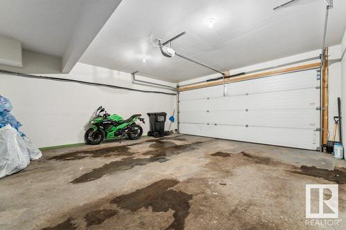 #58 6075 Schonsee Wy Nw, Edmonton, AB - Indoor Photo Showing Garage