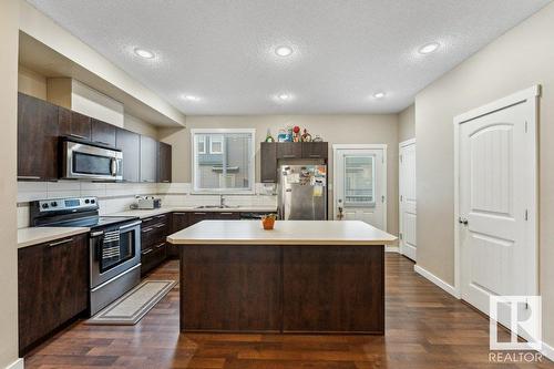 #58 6075 Schonsee Wy Nw, Edmonton, AB - Indoor Photo Showing Kitchen