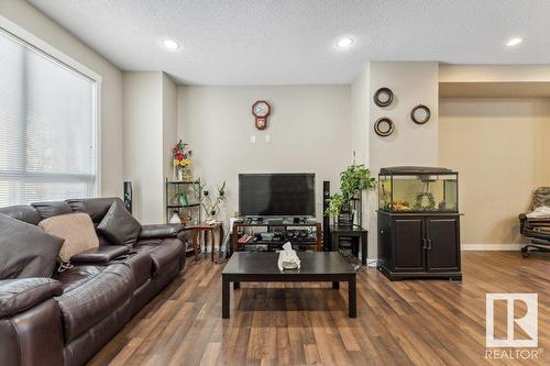 #58 6075 Schonsee Wy Nw, Edmonton, AB - Indoor Photo Showing Living Room