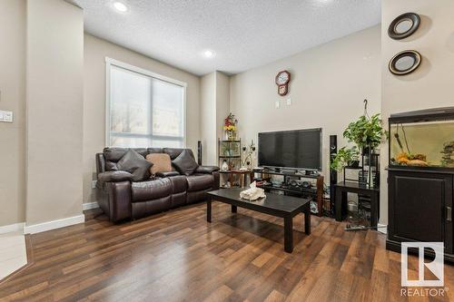 #58 6075 Schonsee Wy Nw, Edmonton, AB - Indoor Photo Showing Living Room