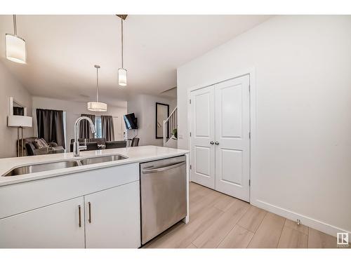 3843 Chrustawka Place Pl Sw, Edmonton, AB - Indoor Photo Showing Kitchen With Double Sink