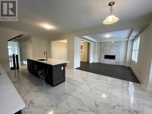 34 Lockyer Drive, Whitby, ON - Indoor Photo Showing Other Room With Fireplace