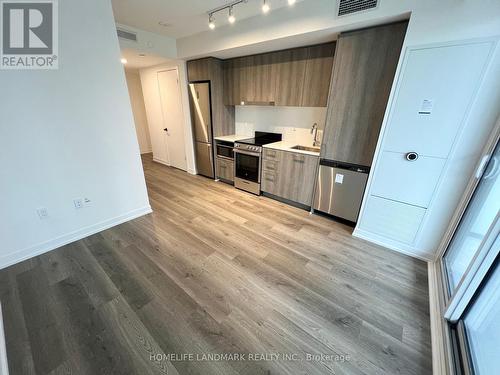 319 - 195 Commerce Street, Vaughan, ON - Indoor Photo Showing Kitchen With Stainless Steel Kitchen