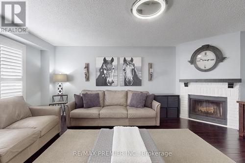 16 Jameson Crescent, Brampton, ON - Indoor Photo Showing Living Room With Fireplace