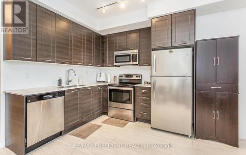 901 - 50 Bruyeres Mews, Toronto, ON - Indoor Photo Showing Kitchen With Double Sink