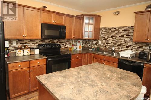 607 715 Hart Road, Saskatoon, SK - Indoor Photo Showing Kitchen With Double Sink