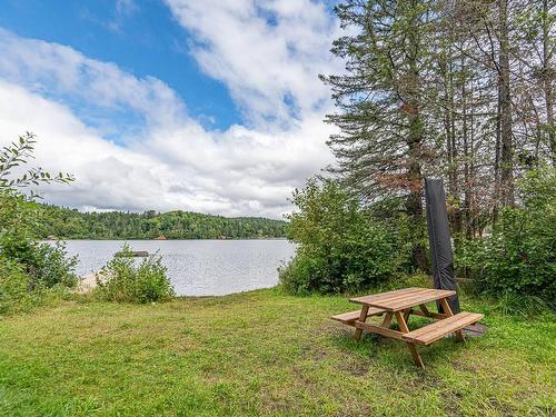 Waterfront - 2031 Imp. Des Pignons-Rouges, Sainte-Agathe-Des-Monts, QC - Outdoor With Body Of Water With View