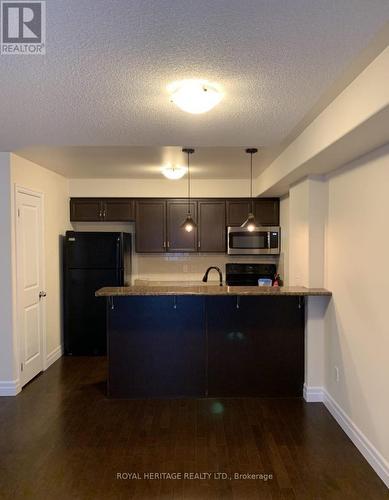 209 - 312 Spillsbury Drive, Peterborough (Otonabee), ON - Indoor Photo Showing Kitchen