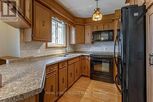 36 St Andrew Street, Aylmer (Ay), ON - Indoor Photo Showing Kitchen With Double Sink