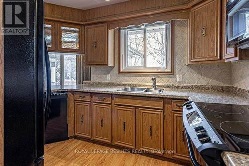 36 St Andrew Street, Aylmer (Ay), ON - Indoor Photo Showing Kitchen With Double Sink