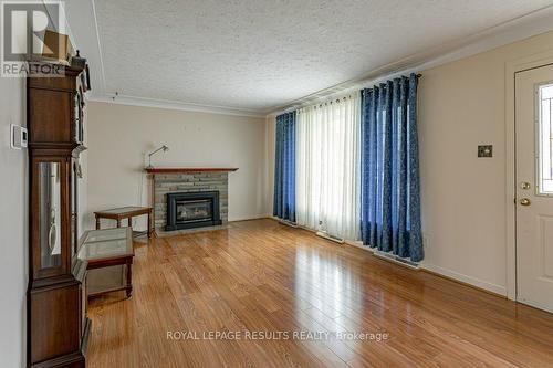 36 St Andrew Street, Aylmer (Ay), ON - Indoor Photo Showing Living Room With Fireplace