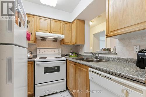 306 - 3088 Kennedy Road, Toronto, ON - Indoor Photo Showing Kitchen With Double Sink