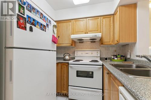 306 - 3088 Kennedy Road, Toronto, ON - Indoor Photo Showing Kitchen With Double Sink