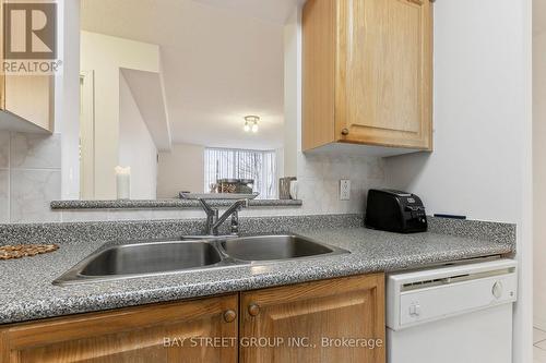 306 - 3088 Kennedy Road, Toronto, ON - Indoor Photo Showing Kitchen With Double Sink