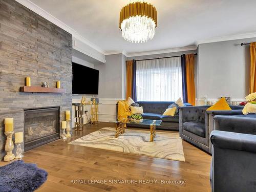 3921 Thomas Alton Blvd, Burlington, ON - Indoor Photo Showing Living Room With Fireplace