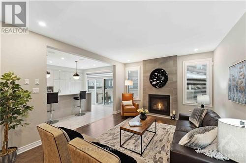 29 Malachigan Crescent, Ottawa, ON - Indoor Photo Showing Living Room With Fireplace