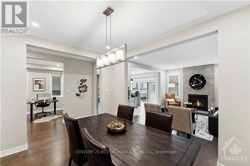 29 Malachigan Crescent, Ottawa, ON - Indoor Photo Showing Dining Room With Fireplace