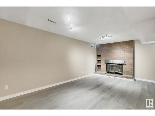 3833 85 St Nw, Edmonton, AB - Indoor With Fireplace