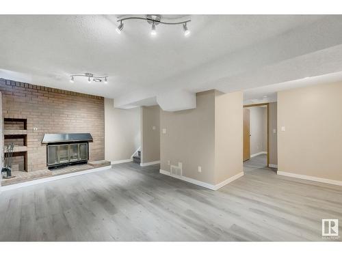 3833 85 St Nw, Edmonton, AB - Indoor With Fireplace