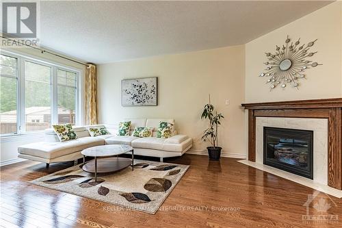 919 Bunchberry Way, Ottawa, ON - Indoor Photo Showing Living Room With Fireplace