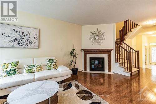 919 Bunchberry Way, Ottawa, ON - Indoor Photo Showing Living Room With Fireplace