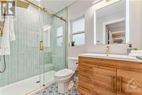 Modern ensuite with anti-fog & dimmable lighting mirrors. - 62 Erin Crescent, Ottawa, ON - Indoor Photo Showing Bathroom