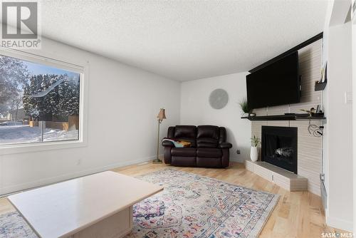 3 Killarney Way, Regina, SK - Indoor Photo Showing Living Room With Fireplace