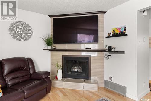 3 Killarney Way, Regina, SK - Indoor Photo Showing Living Room With Fireplace