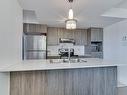 Kitchen - 440-10050 Place De L'Acadie, Montréal (Ahuntsic-Cartierville), QC  - Indoor Photo Showing Kitchen With Double Sink With Upgraded Kitchen 