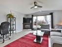 Salon - 1A Rue Viau, Saint-Jean-Sur-Richelieu, QC  - Indoor Photo Showing Living Room With Fireplace 