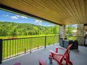 View - 204-310 Ch. Louis-Dufour, Saint-Sauveur, QC  - Outdoor With Deck Patio Veranda With Exterior 