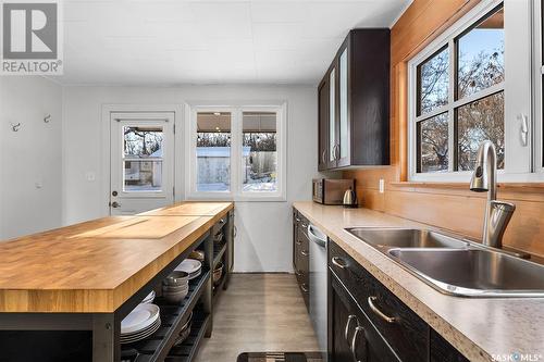 210-212 Watrous Street, Manitou Beach, SK - Indoor Photo Showing Kitchen With Double Sink