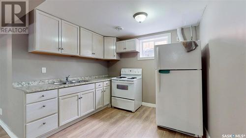 6814 1St Avenue N, Regina, SK - Indoor Photo Showing Kitchen With Double Sink