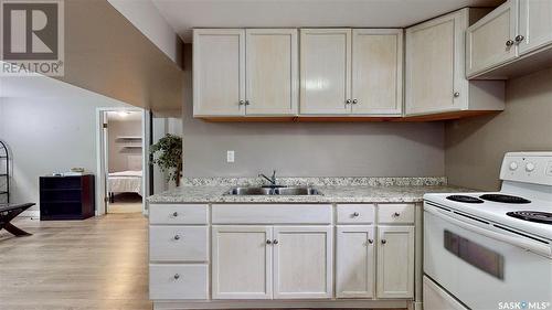 6814 1St Avenue N, Regina, SK - Indoor Photo Showing Kitchen With Double Sink