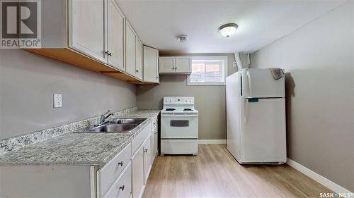 6814 1St Avenue N, Regina, SK - Indoor Photo Showing Kitchen With Double Sink